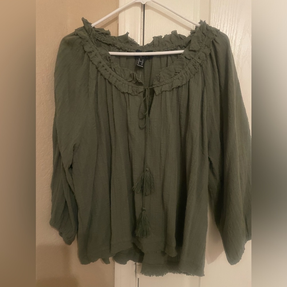Olive green Top in size 1X with tassels on the tie and round neck line.